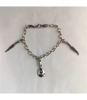 Bracelet gourmette et ses charms