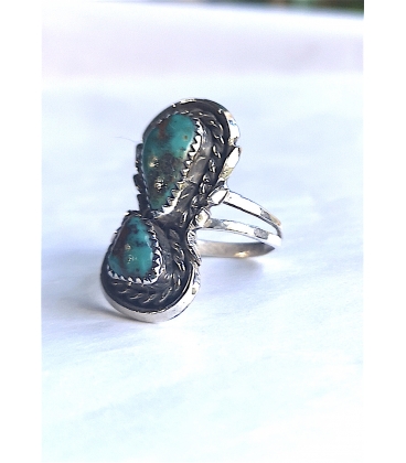 Bague et ses deux turquoises
