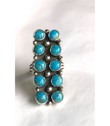 Bague longue et ses 10 turquoises