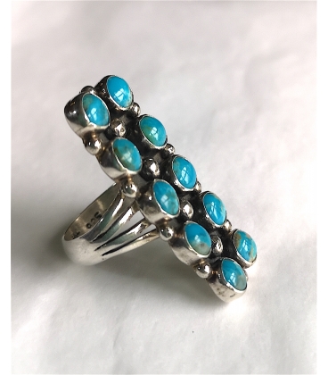 Bague longue et ses 10 turquoises