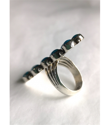 Bague longue et ses 10 turquoises